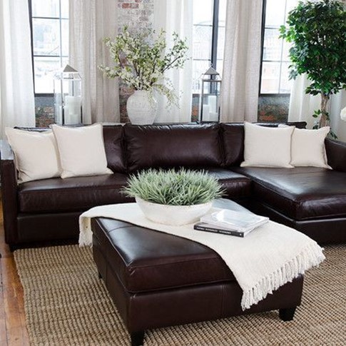 chocolate brown couch with throw pillows