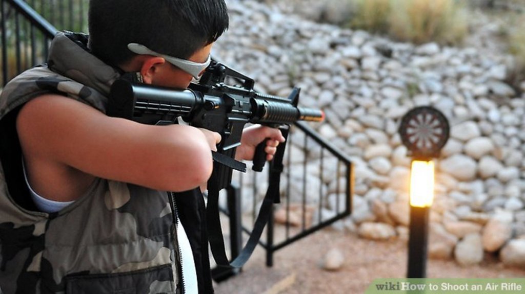 Shooting Guns Topless