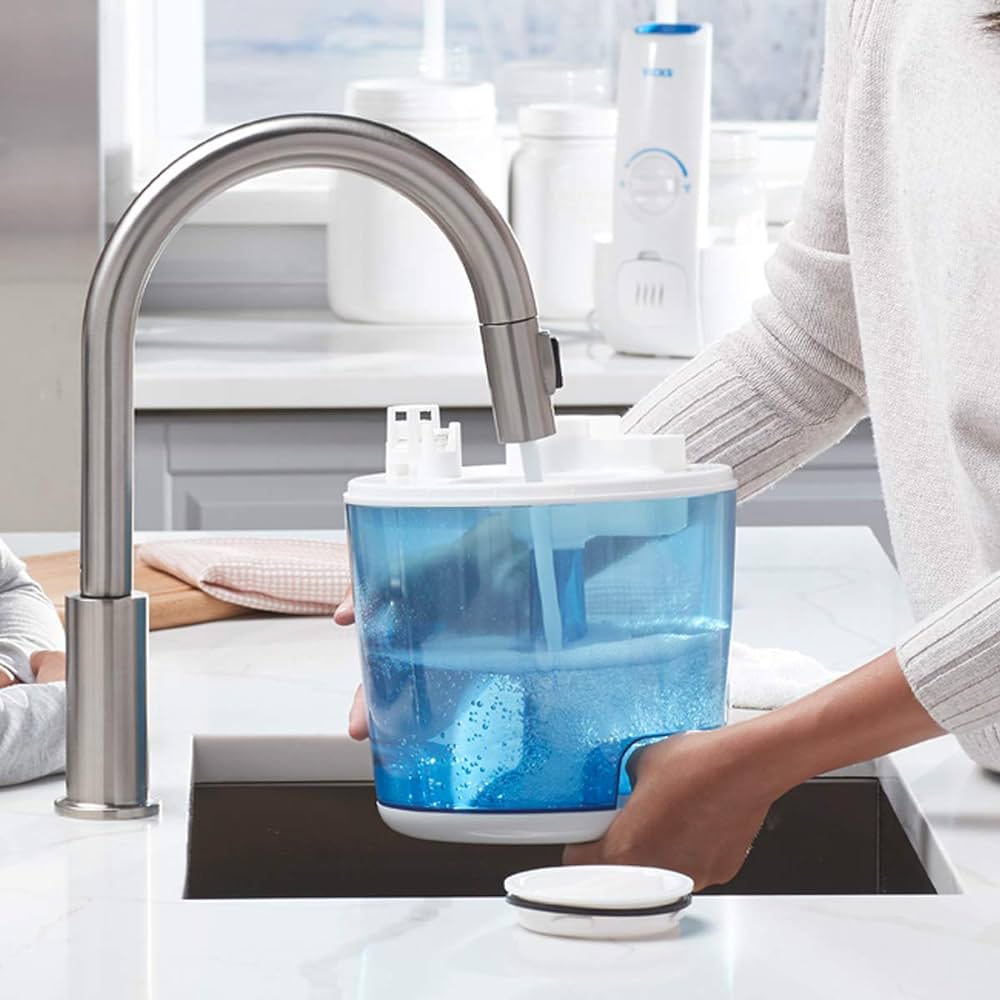  A woman washing her hands with a blue water dispenser