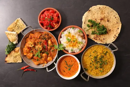 Vibrant Indian dishes beautifully arranged on a table