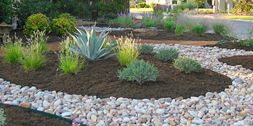  Rocks and plants beautify the garden. Consider the type of rock used