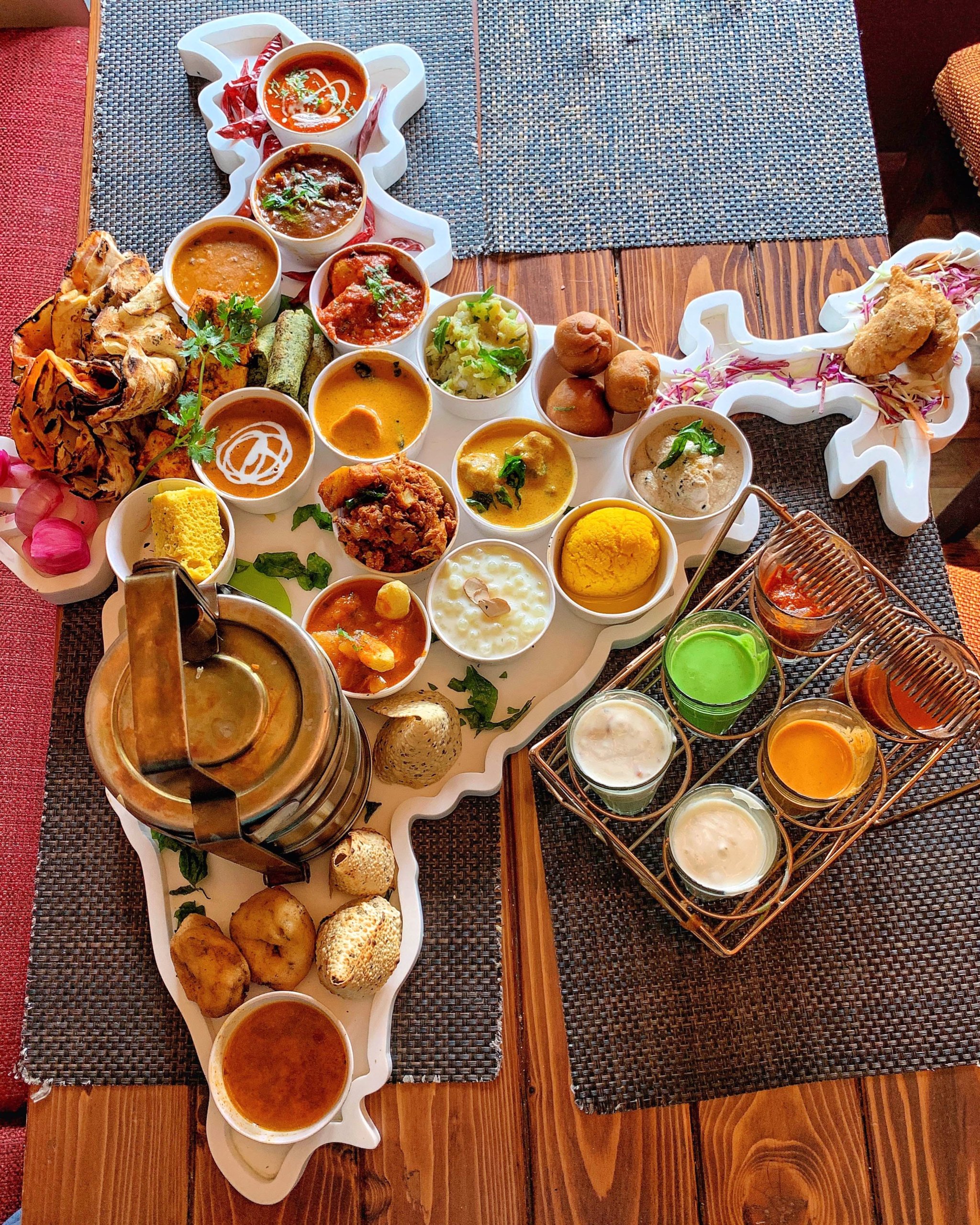 A table filled with a variety of delicious food representing cultural diversity