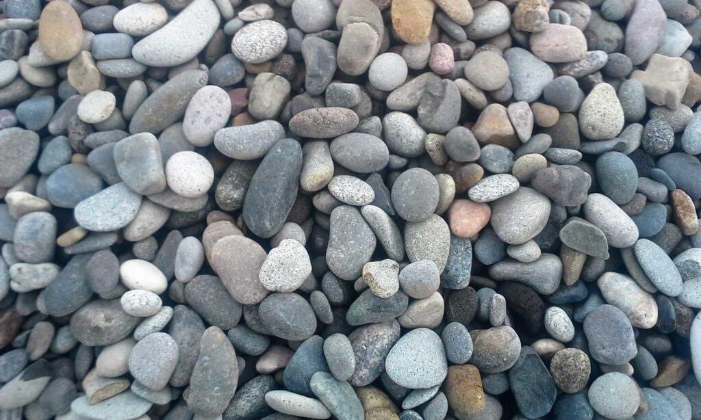 Assorted rocks of different sizes stacked together