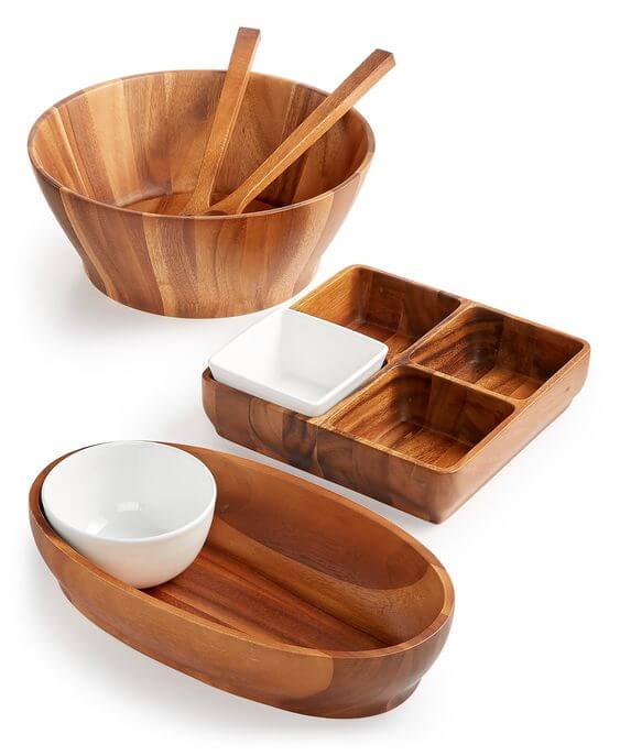 A wooden bowl and spoon set made from acacia wood