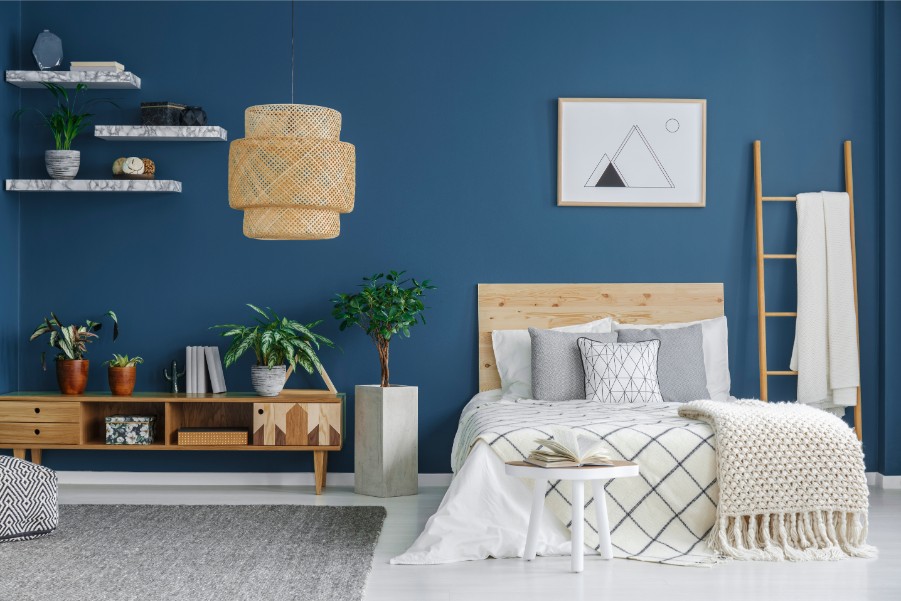blue-bedroom-with-floating-shelves-paintzen